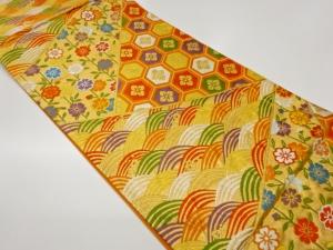 切り嵌め風枝垂れ桜に花菱亀甲・荒波模様織出し袋帯